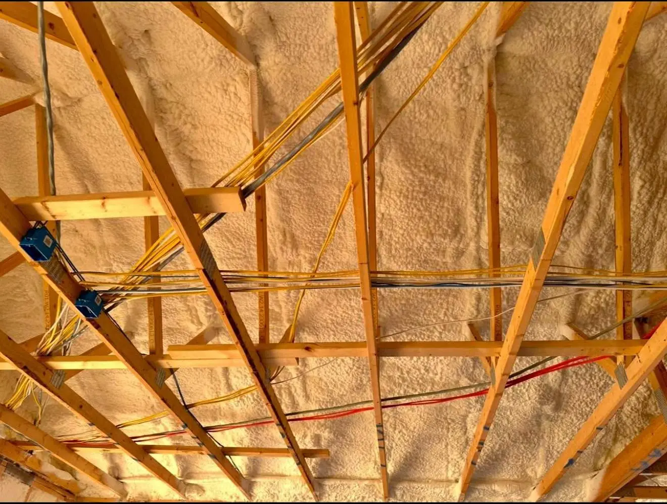 Open-cell spray foam in interior walls
